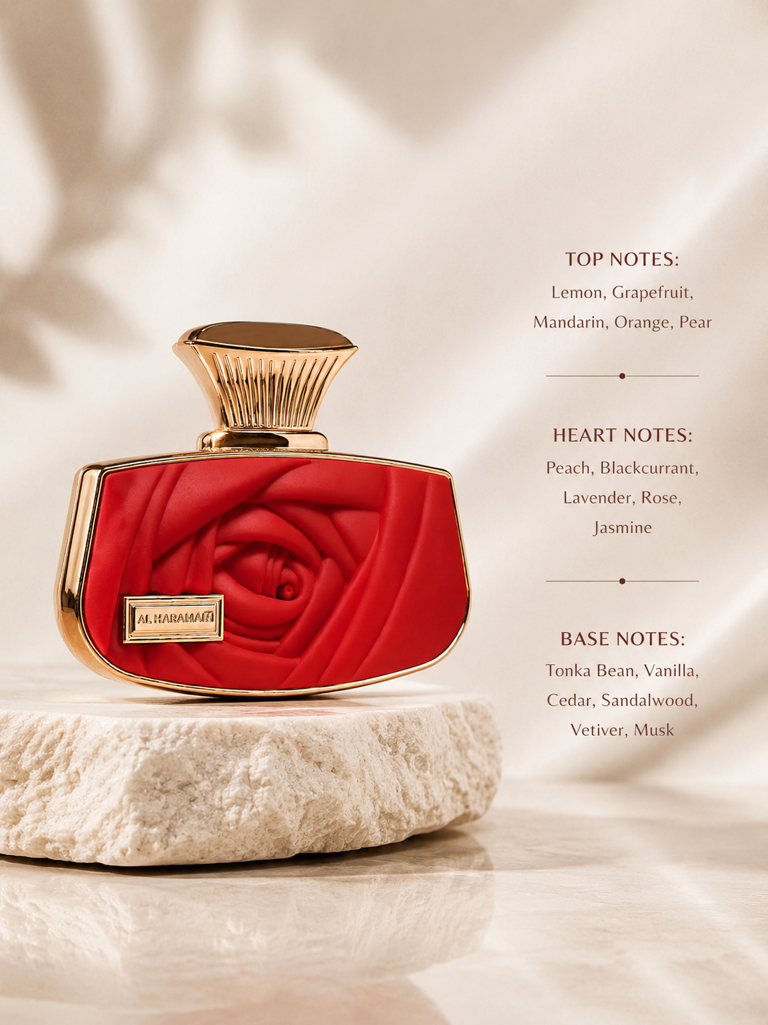 Red perfume bottle with gold cap on a light background