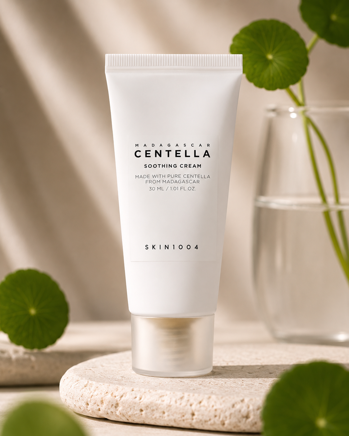 SKIN1004 Madagascar Centella Soothing Cream 30ml with green leaves in the background