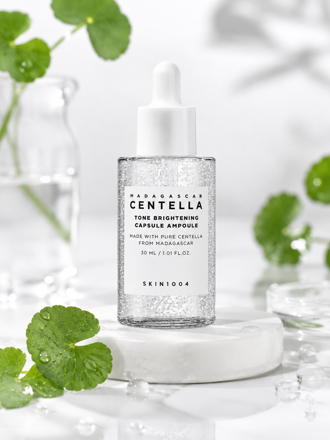 SKIN1004 Madagascar Centella Tone Brightening Capsule Ampoule 30ml on a white background with green leaves.